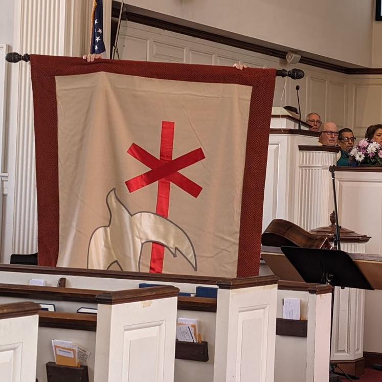 Banner presented during worship service